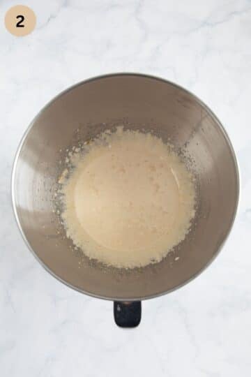 creamed eggs and sugar in a bowl for making cherry cake batter.