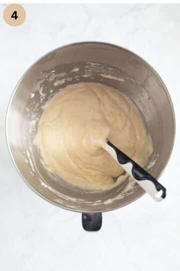 folding beaten egg whites into cake batter with a spatula.