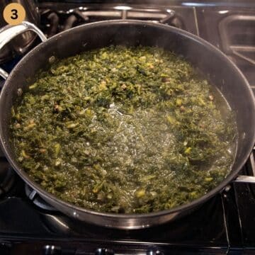 simmering german kale in a large pot .