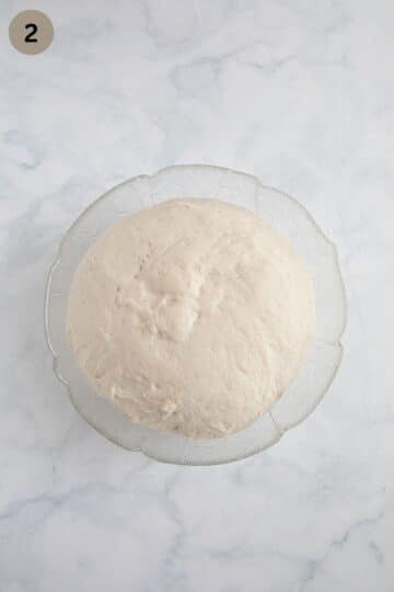 rised dough for making german pretzels in a bowl.