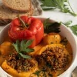 pin image with the title mushroom stuffed peppers.