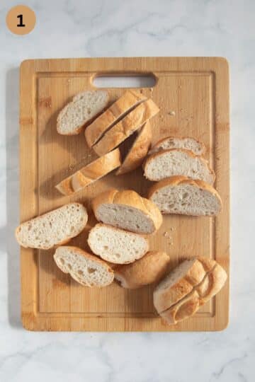 sliced stale bread rolls for making bread pudding with plums.